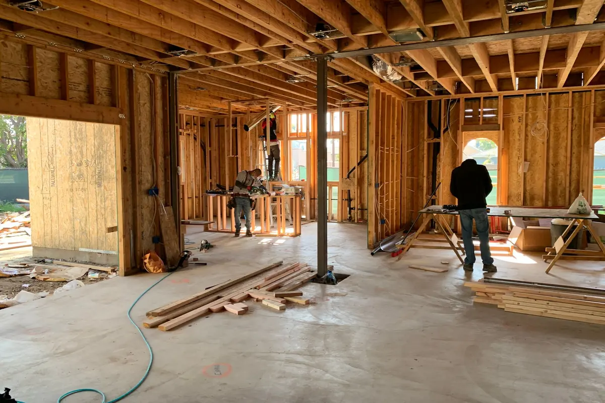 Construction crew framing the interior of a home